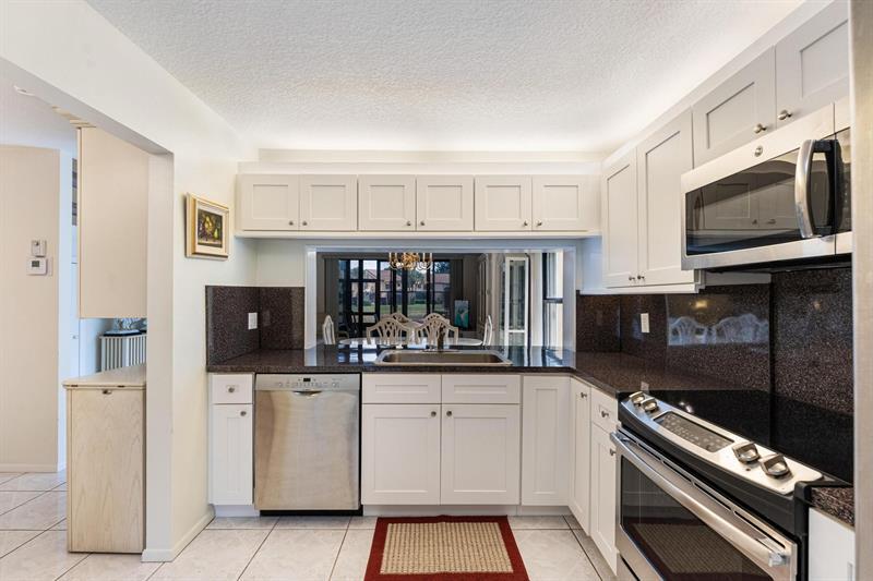 Property Photo:  3960 F Cocoplum Cir 3658  FL 33063 
