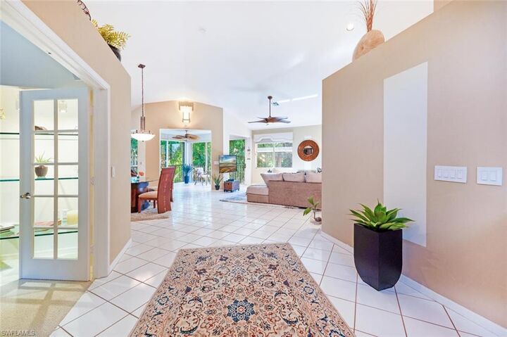 Property Photo: 15260 Cedarwood Ln A201 FL 34110