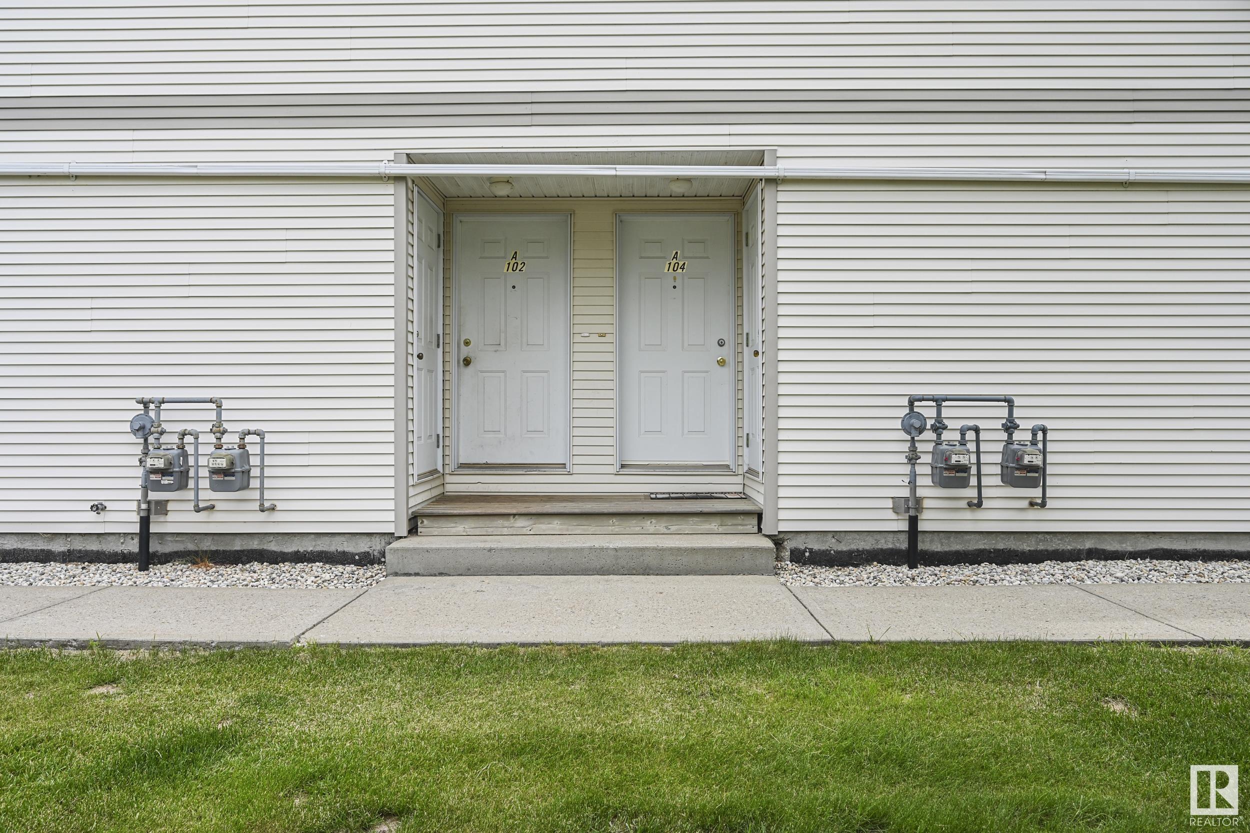Property Photo: 110 Westpark Drive 104A AB T8L 4M2