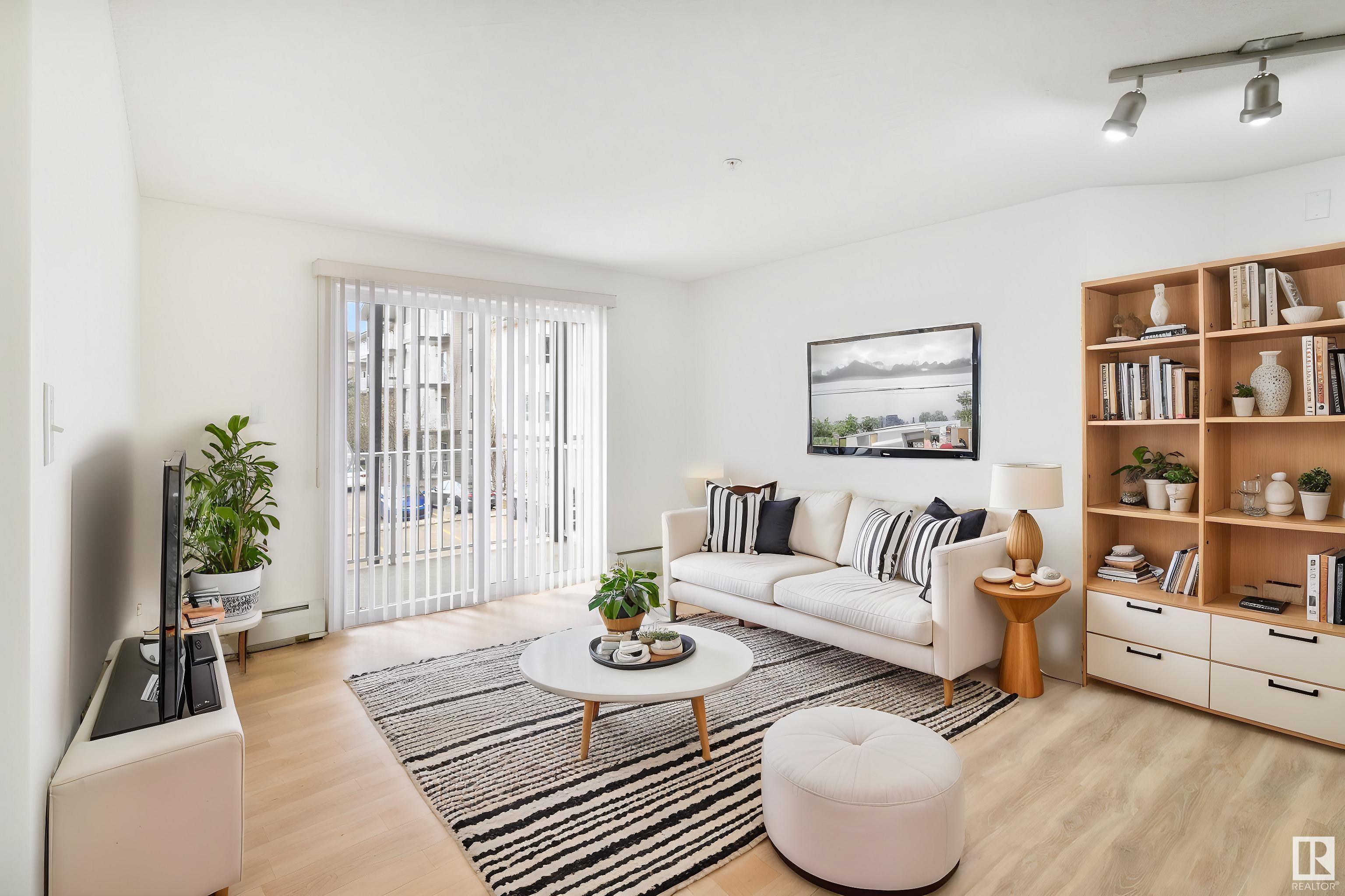 Property Photo:  155 Edwards Drive SW 218  AB T6X 1N6 