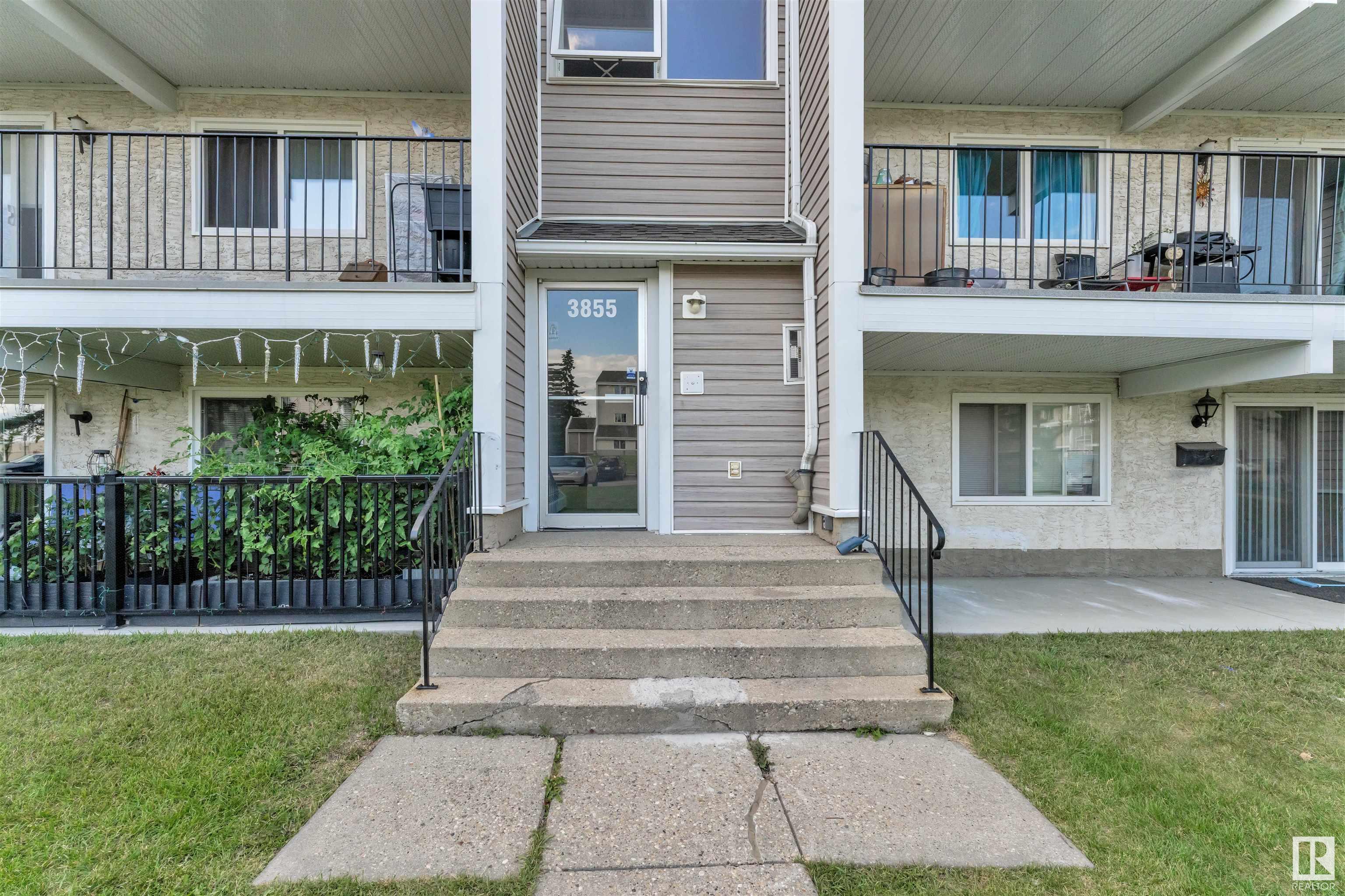 Property Photo:  3855 76 Street NW 5  AB T6K 2P9 