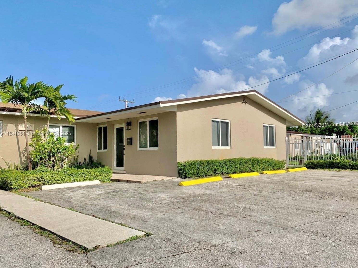 Property Photo:  10300 NW 35th Ct  FL 33147 