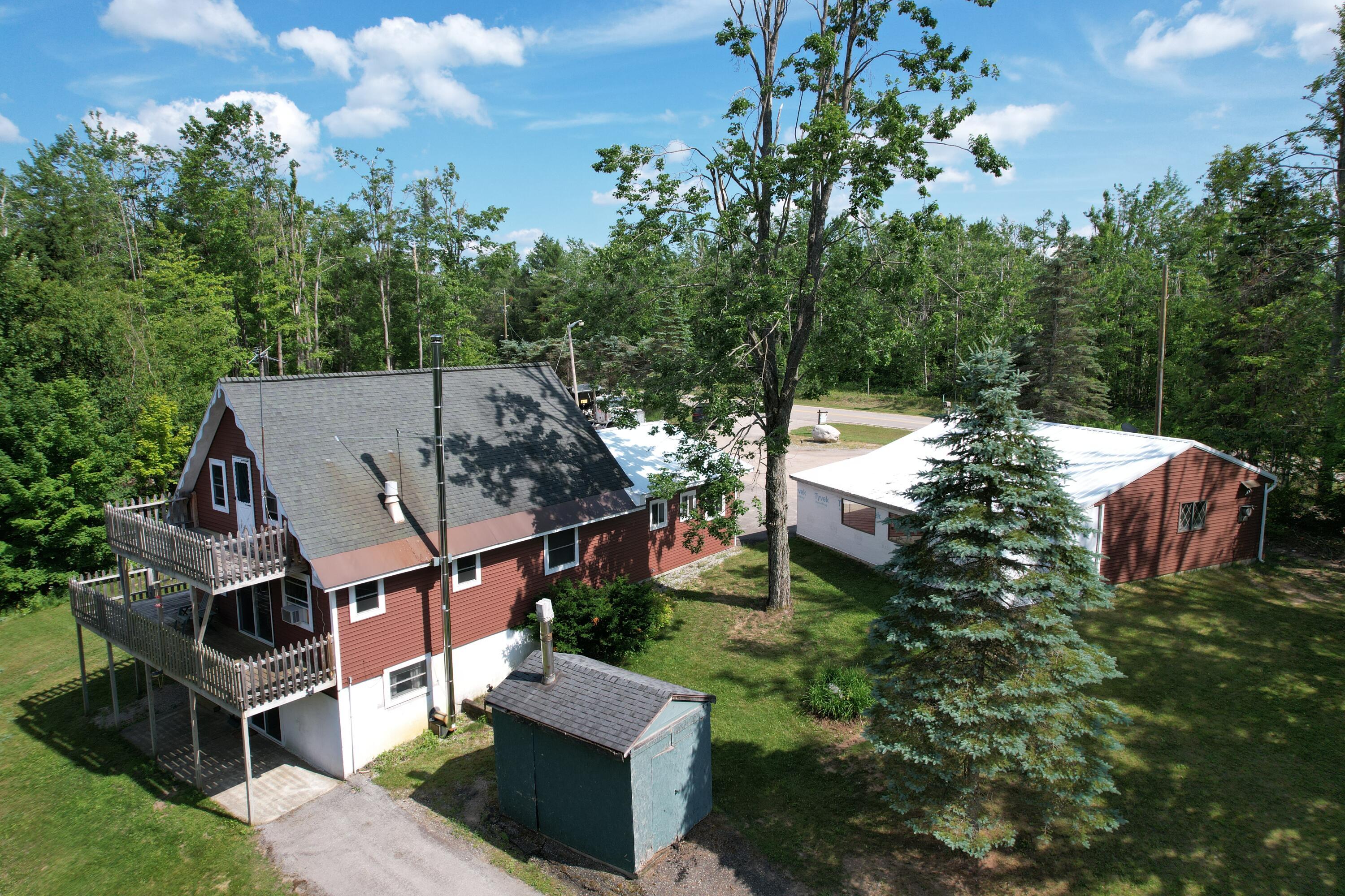 Property Photo:  6876 Old Alba Road  MI 49735 