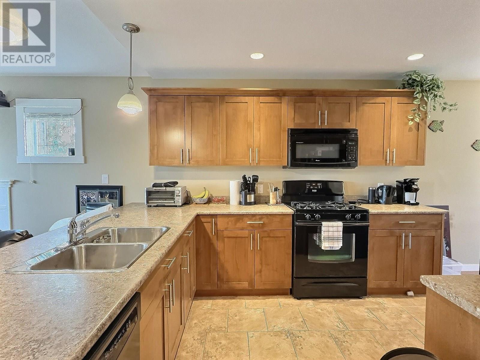 Property Photo: 900 Stagecoach Drive 38 BC V2B 0B7