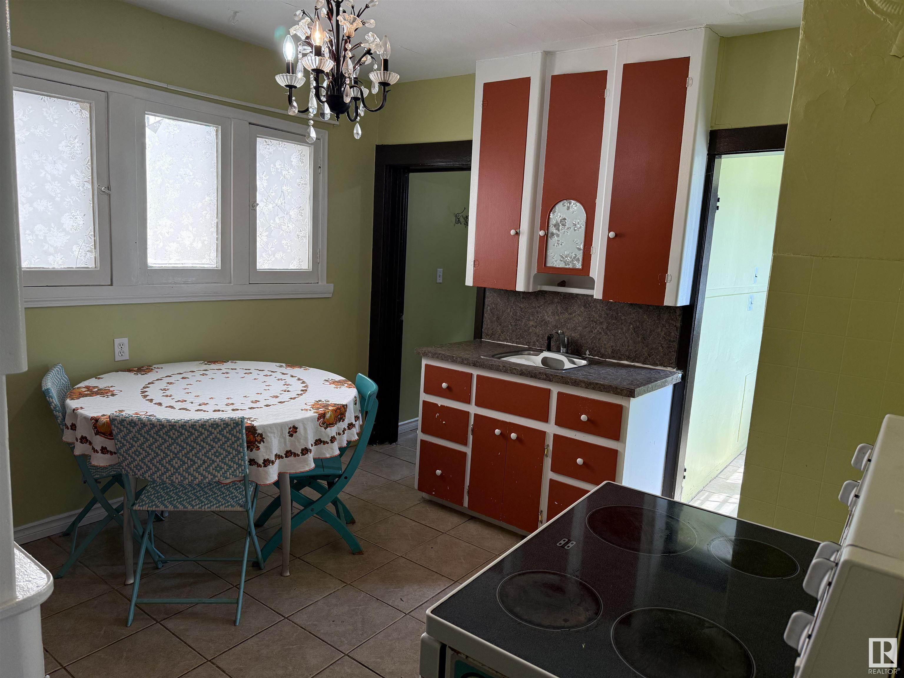 Property Photo:  12027 93 Street NW  AB T5G 1E7 