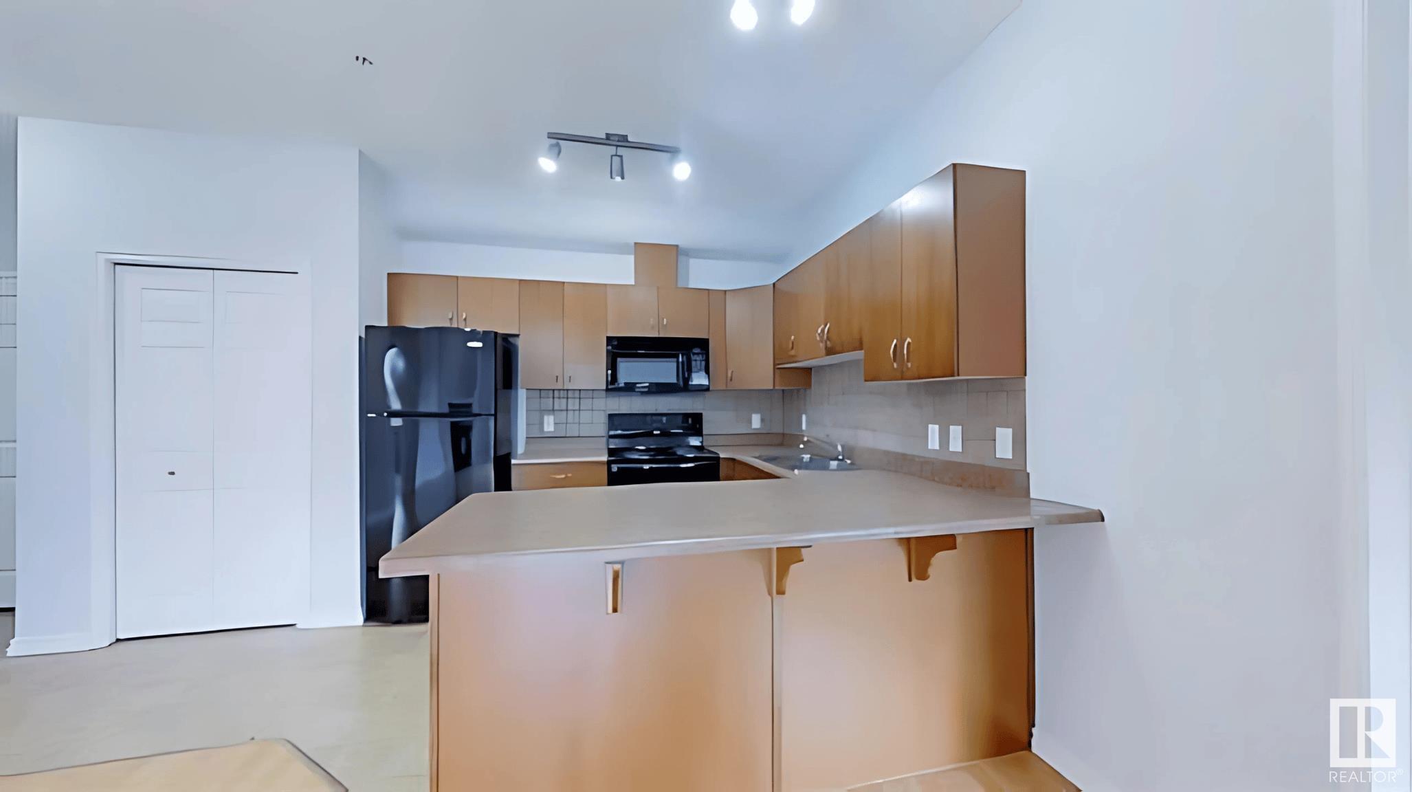 Property Photo:  10235 112 Street NW 212  AB T5K 1M7 