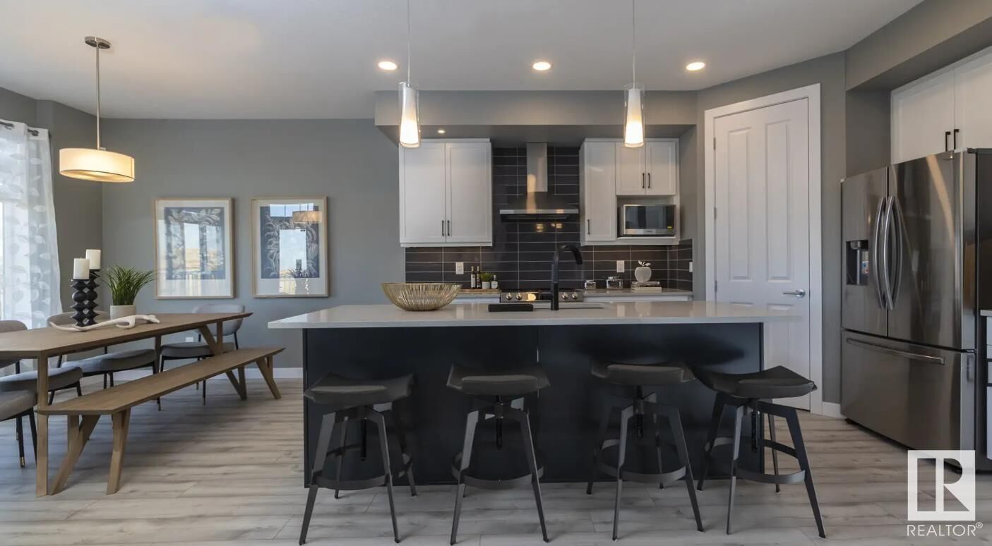 Property Photo:  5407 Parc Reunis Way  AB T4X 2Z7 