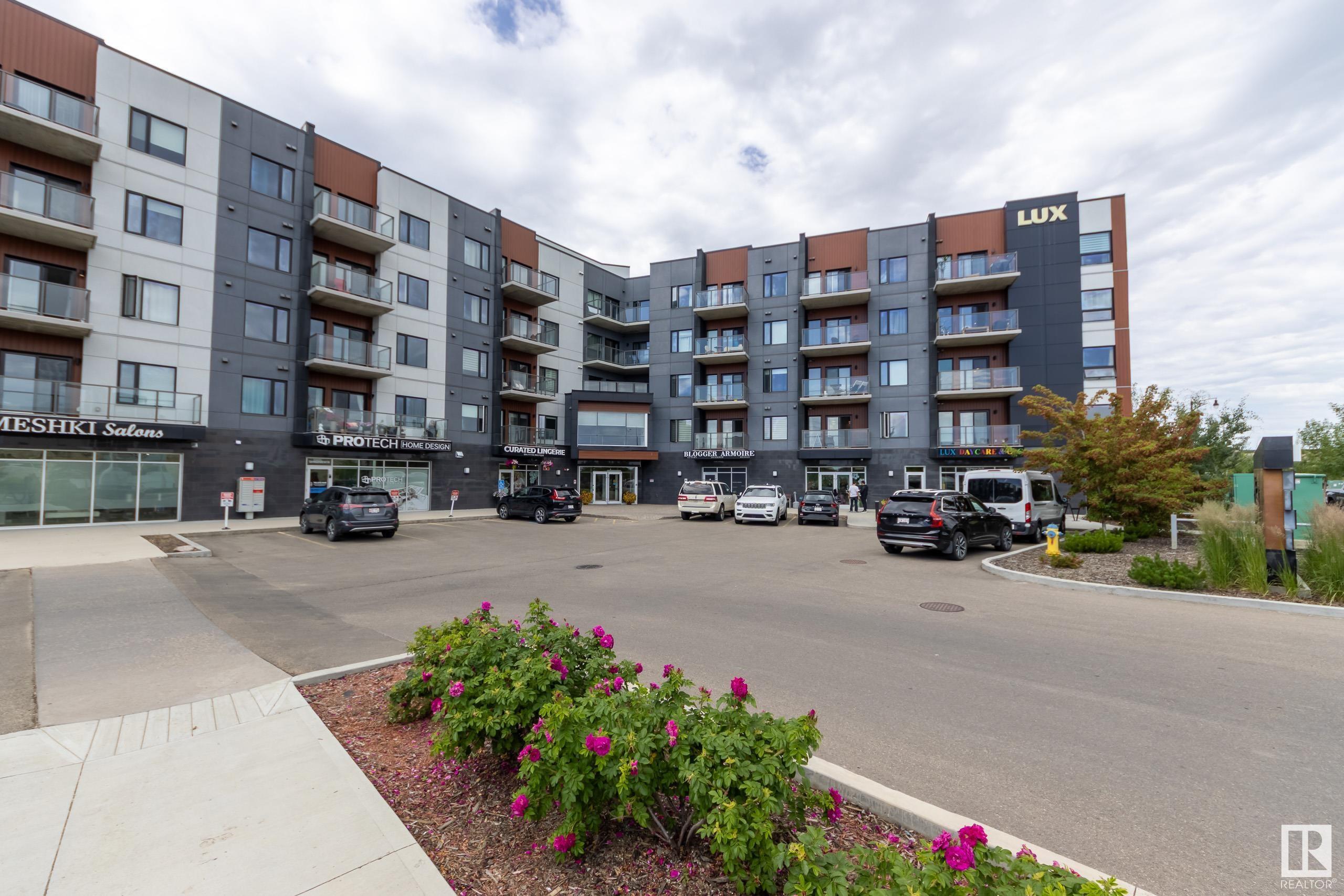 Property Photo: 1316 Windermere Way SW 401 AB T6W 2J3