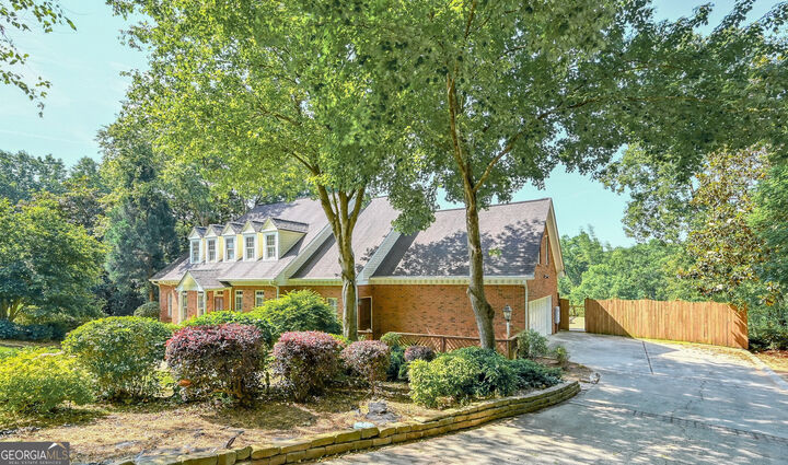 Property Photo:  4070 Runnymede Drive SW  GA 30047 