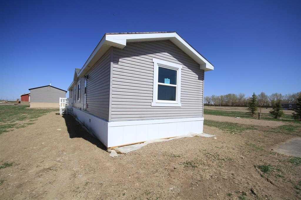 Property Photo: 4821 72 Avenue AB T1G 0G7