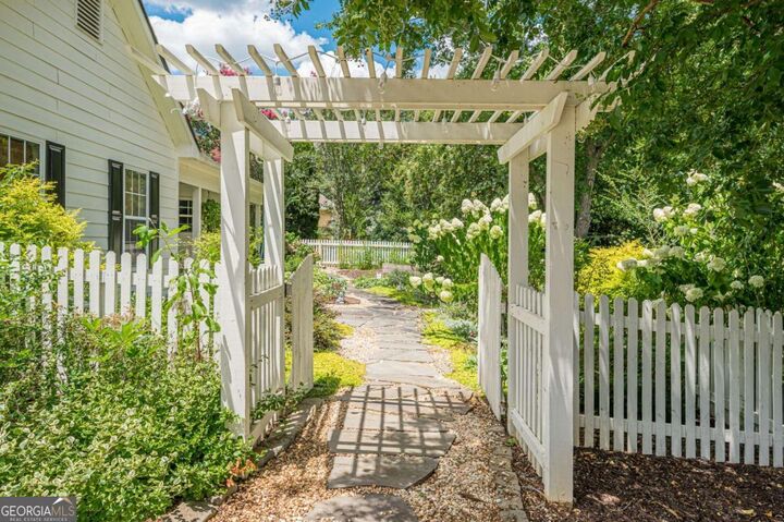 Property Photo:  7820 Silversmith Drive  GA 30028 