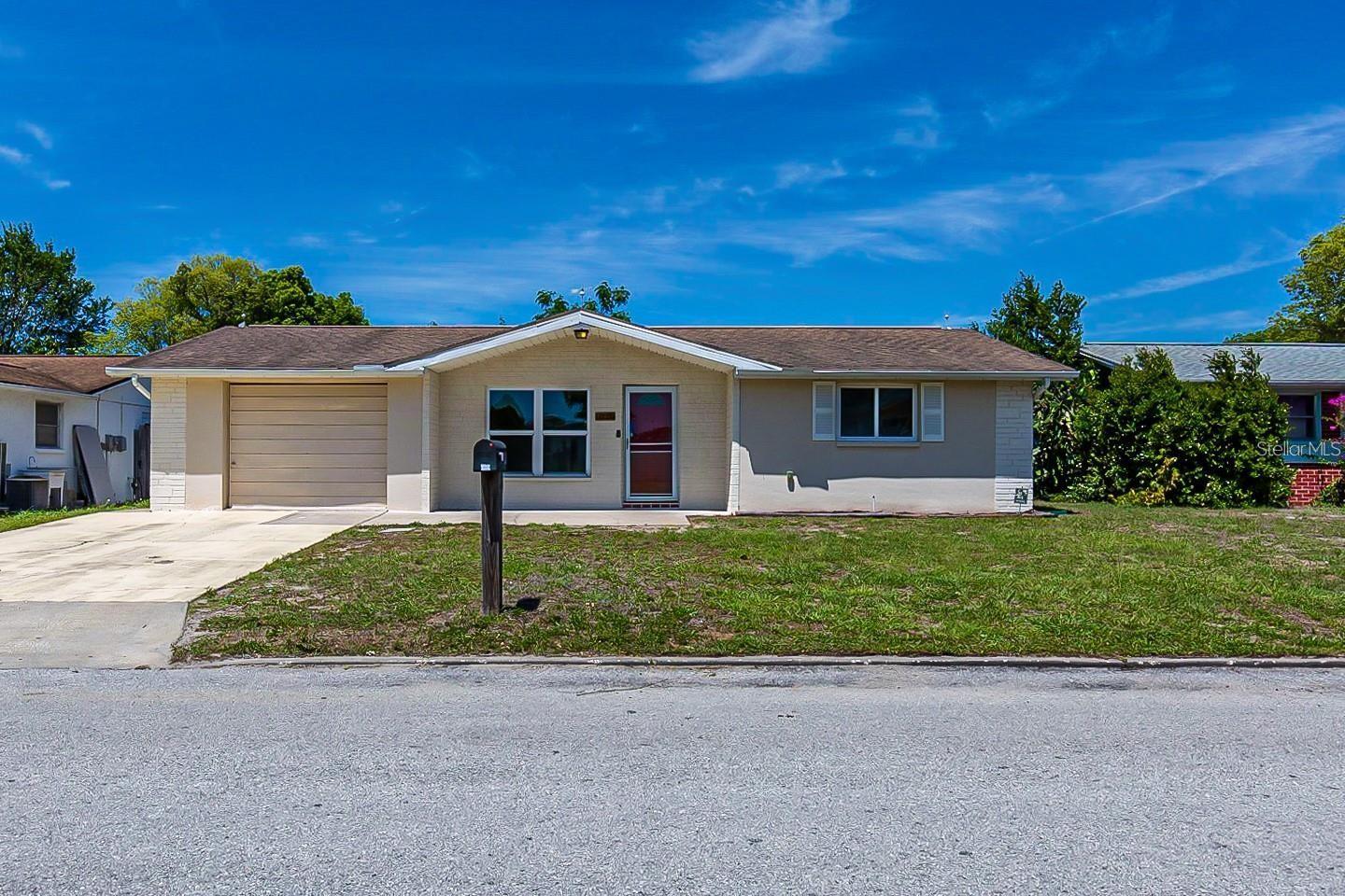 Property Photo: 7735 Foxbloom Drive FL 34668