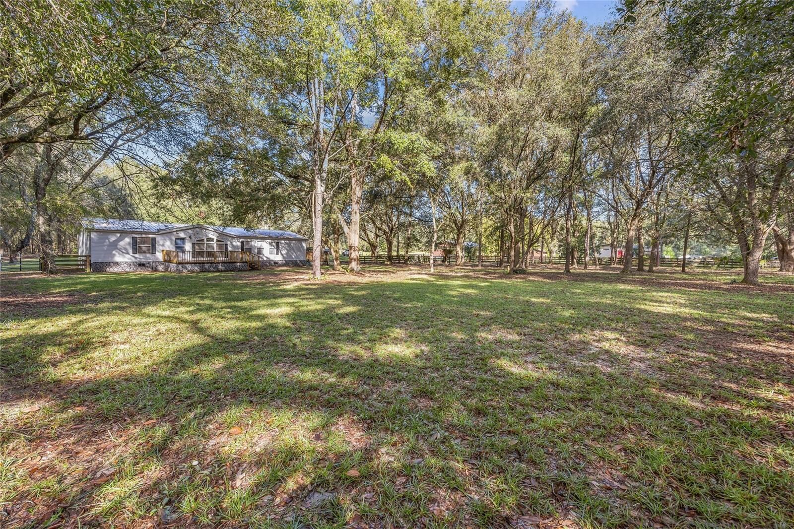 Property Photo:  25013 NW 71st Place  FL 32643 