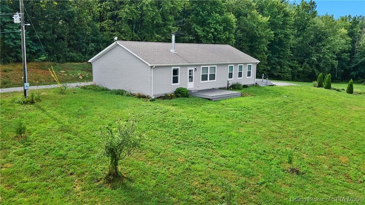 Property Photo:  8807 E Lost College Road  IN 47165 