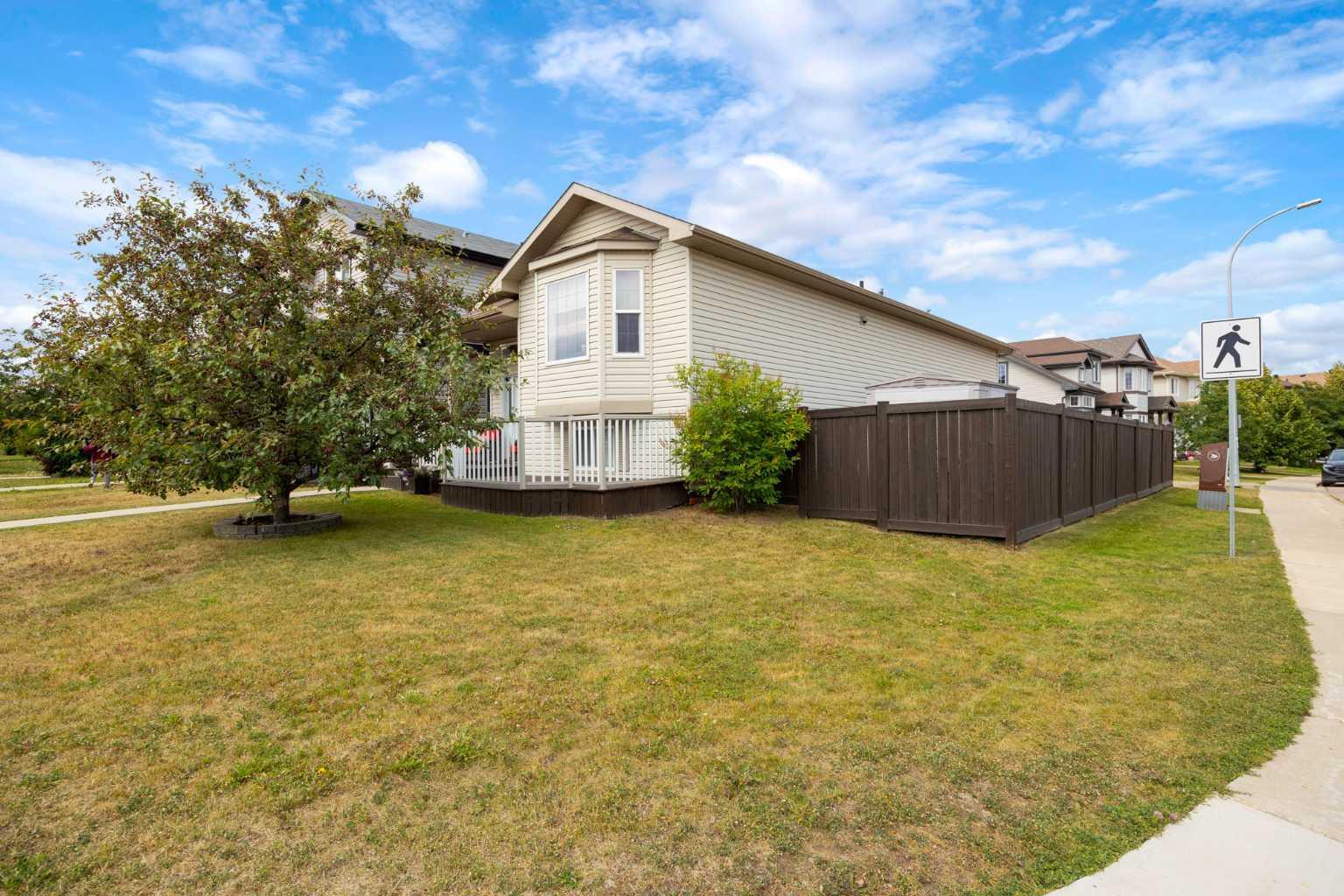 Property Photo: 100 Honeysuckle Way AB T9K 0M7