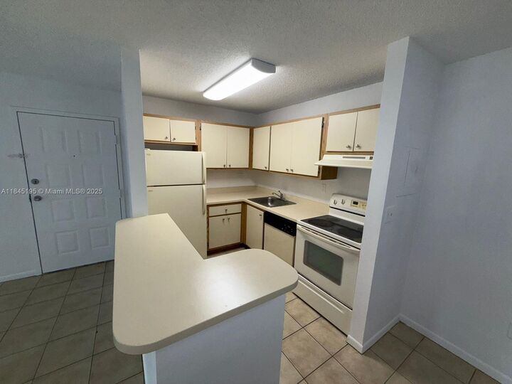 7090 NW 179th St 208  Hialeah FL 33015 photo