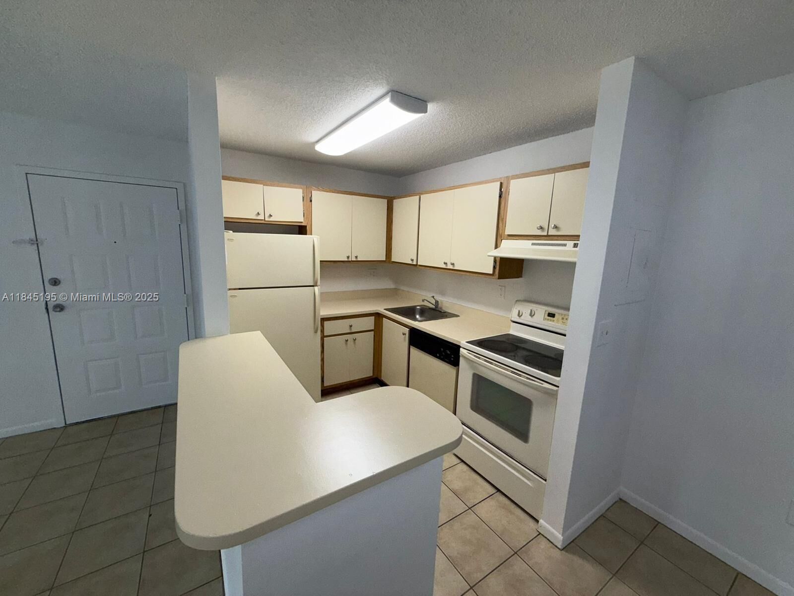 Property Photo:  7090 NW 179th St 208  FL 33015 