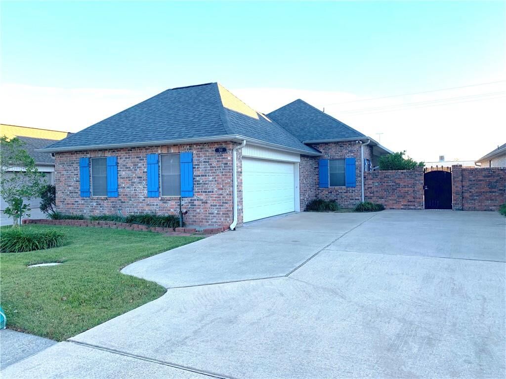 Property Photo:  203 Pecanwood Drive  LA 70605 