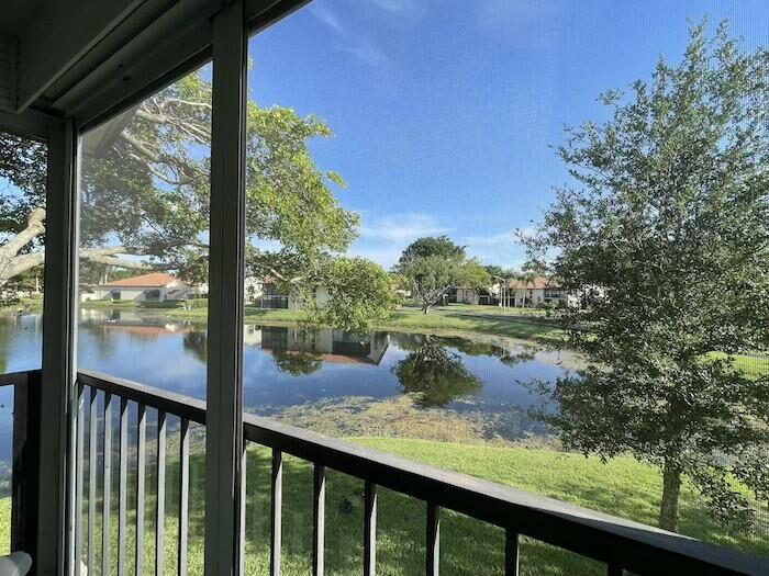 Property Photo:  10656 Tropic Palm Avenue 202  FL 33437 