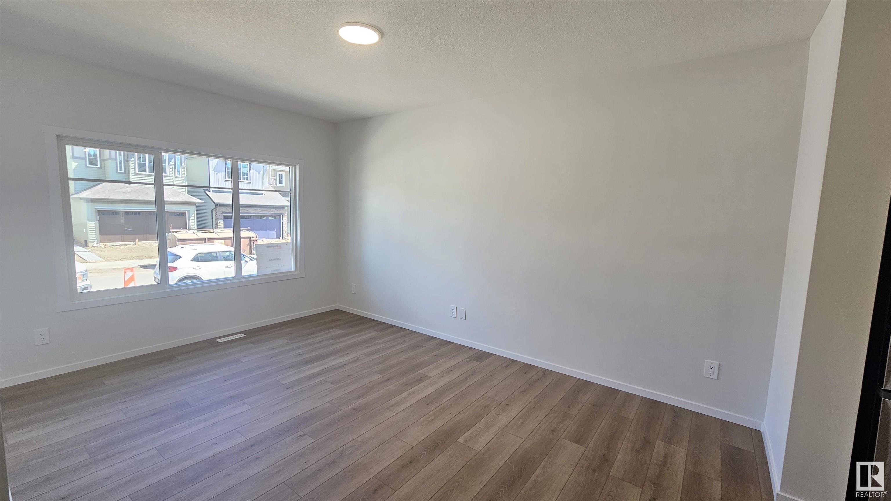 Property Photo:  3732 213 Street NW  AB T6M 3C2 