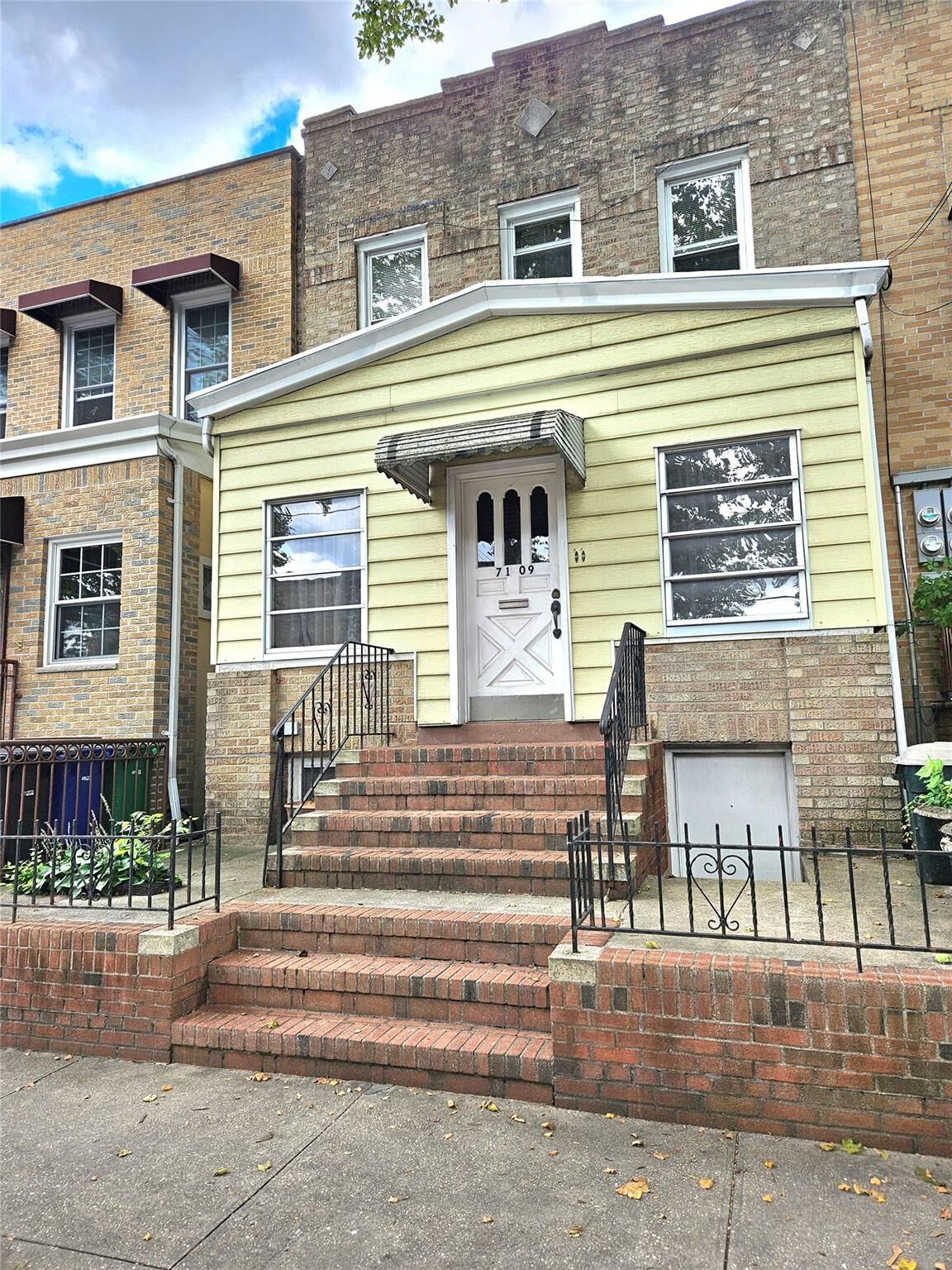 Property Photo:  71-09 68 Street  NY 11385 