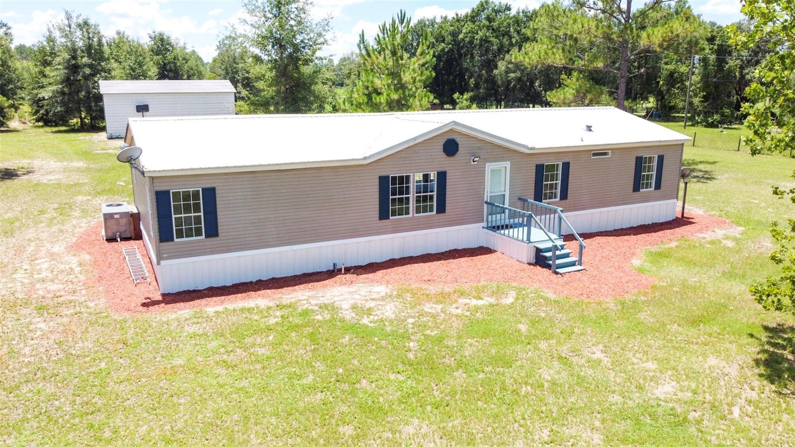 Property Photo: 27913 SW 114th Place FL 32669