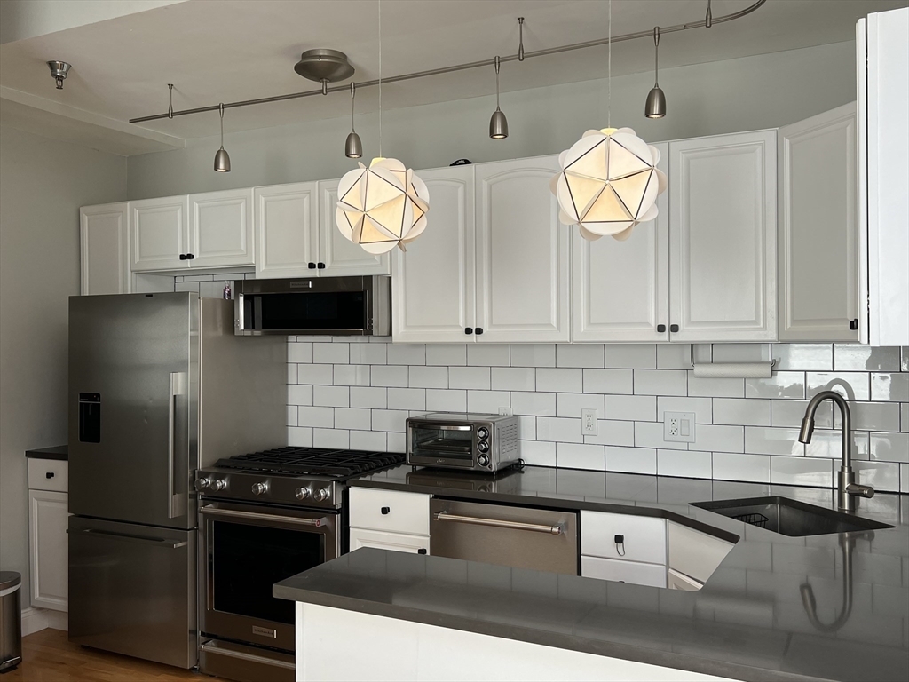 Property Photo: 6 Porter Rd 3L MA 02138
