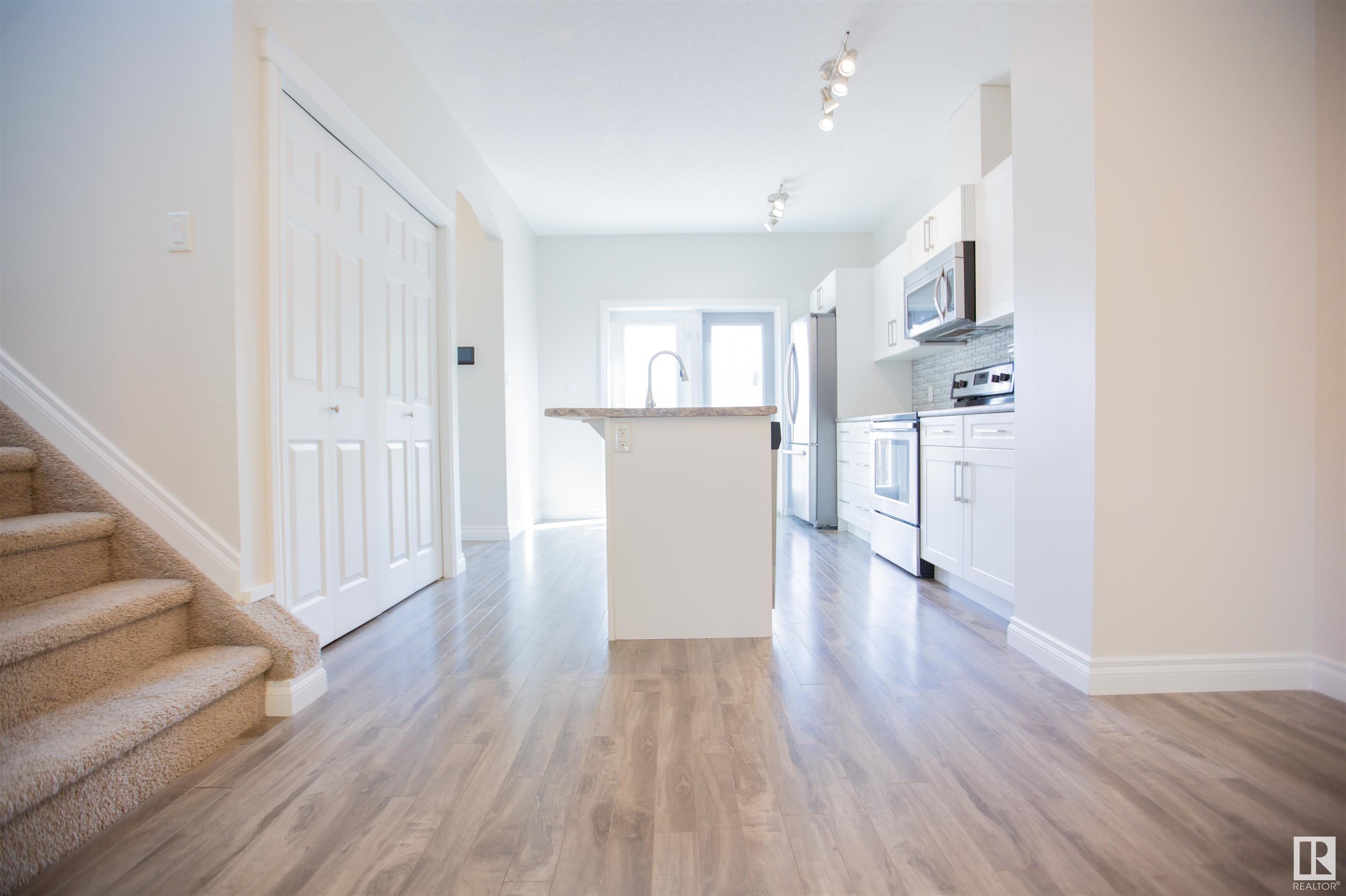 Property Photo:  11215 125 Street NW  AB T5M 0M6 