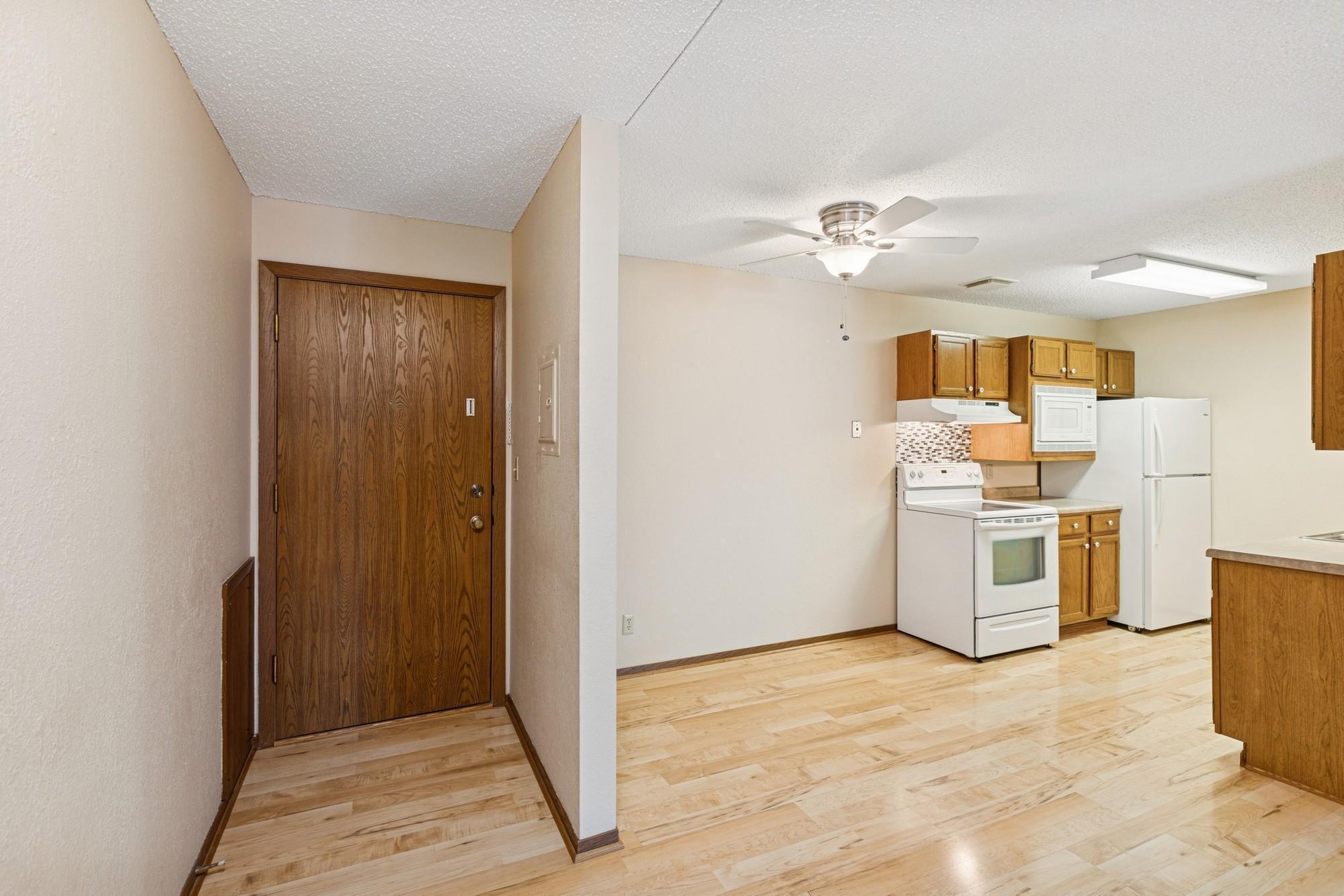 Property Photo: 4 Pine Tree Drive 324 MN 55112