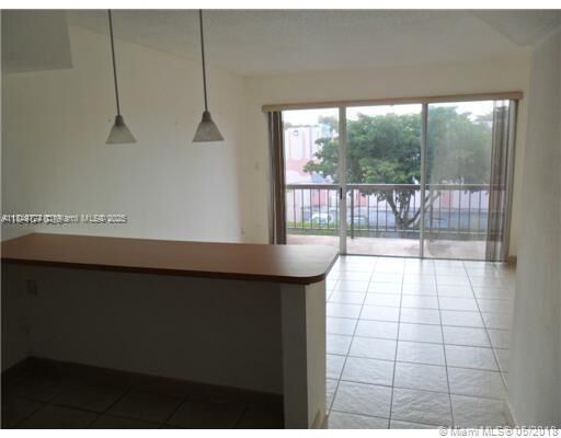 Property Photo: 10900 SW 104th St 323 FL 33176