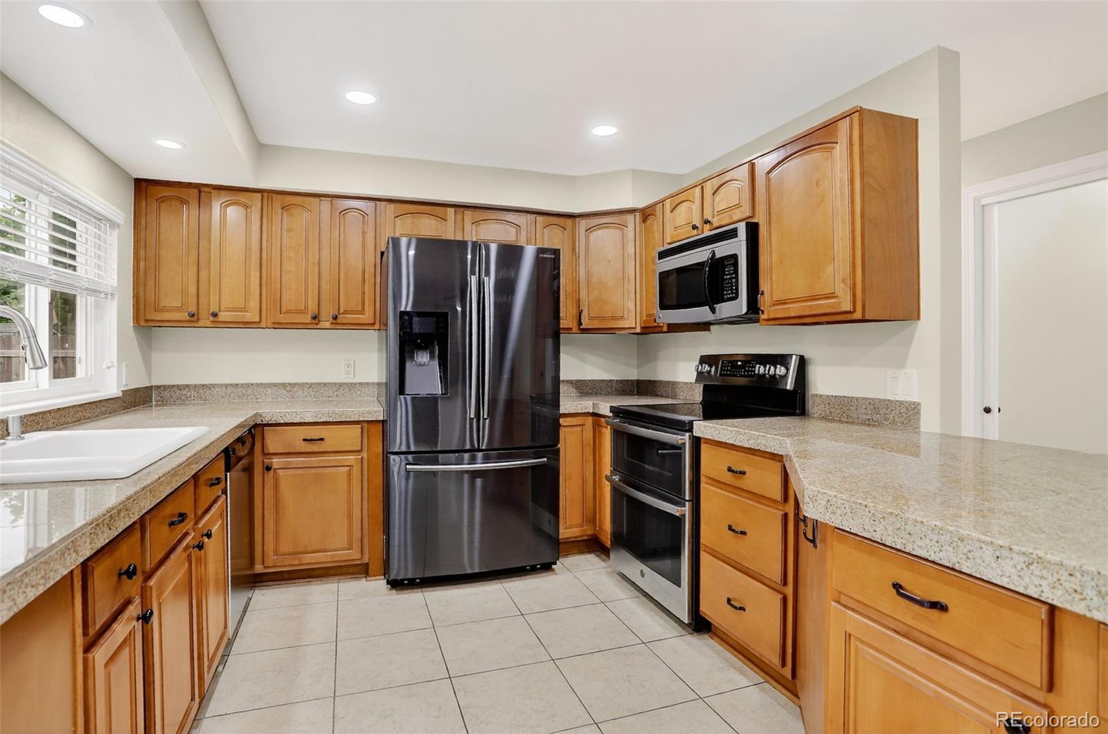 Property Photo: 6976 S Ammons Street CO 80128