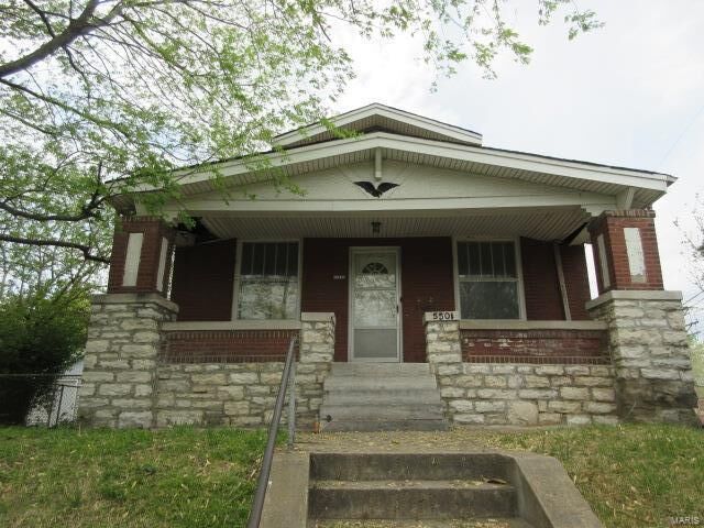Property Photo:  5501 S Broadway  MO 63111 
