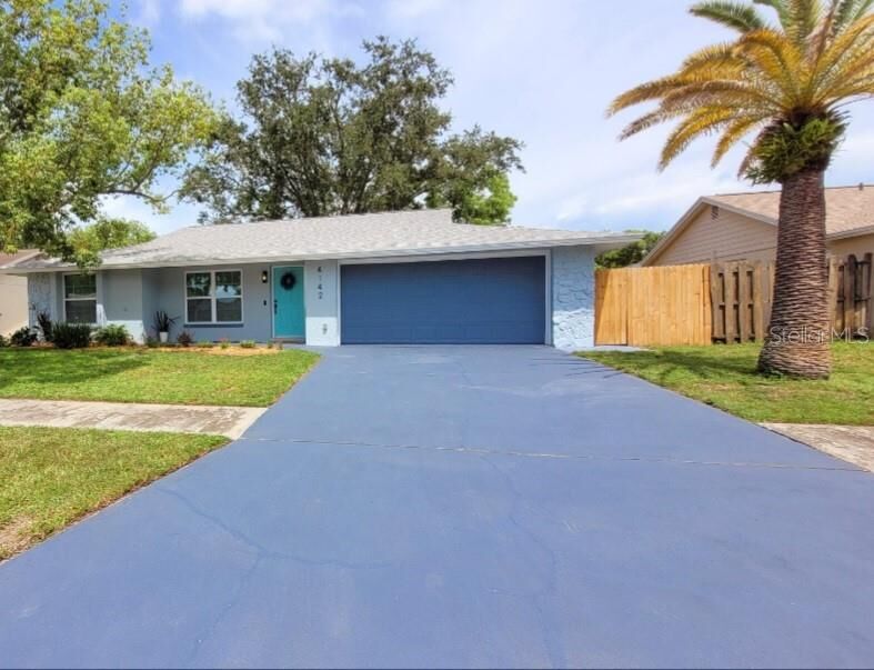 Property Photo: 4142 Sawgrass Boulevard FL 34653