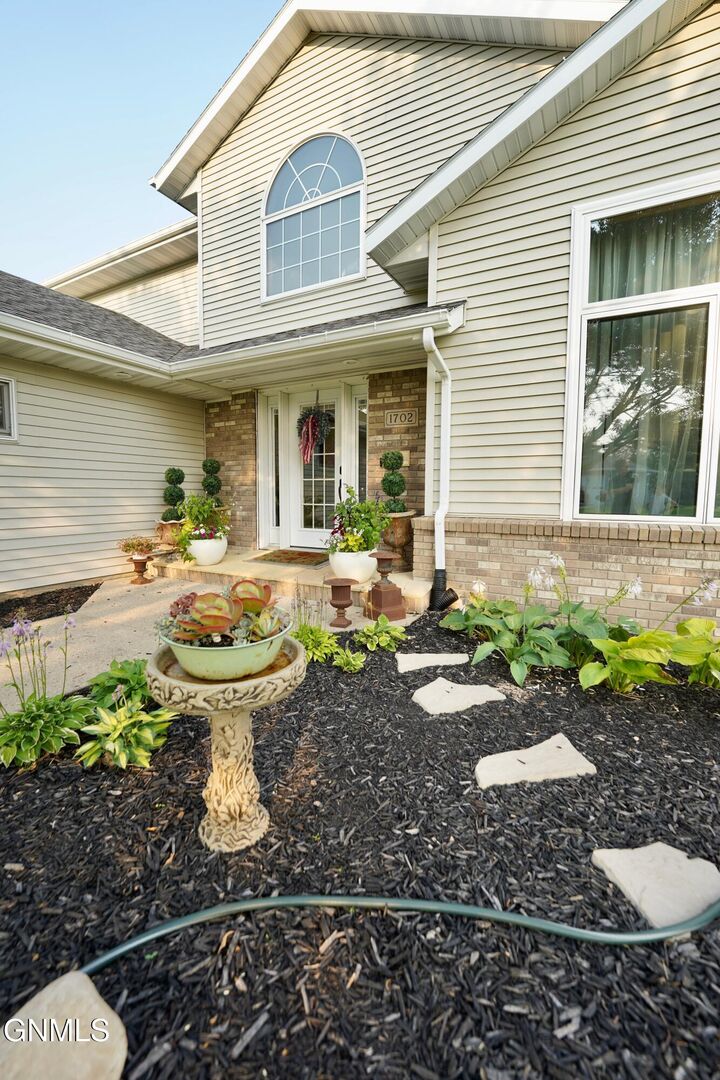 Property Photo: 1702 Evergreen Drive NW ND 58401