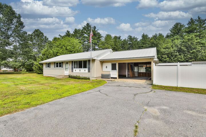 Property Photo:  69 Baboosic Lake Road  NH 03054 