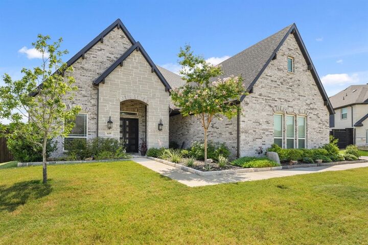 Property Photo: 619 Stonehollow Drive TX 76208