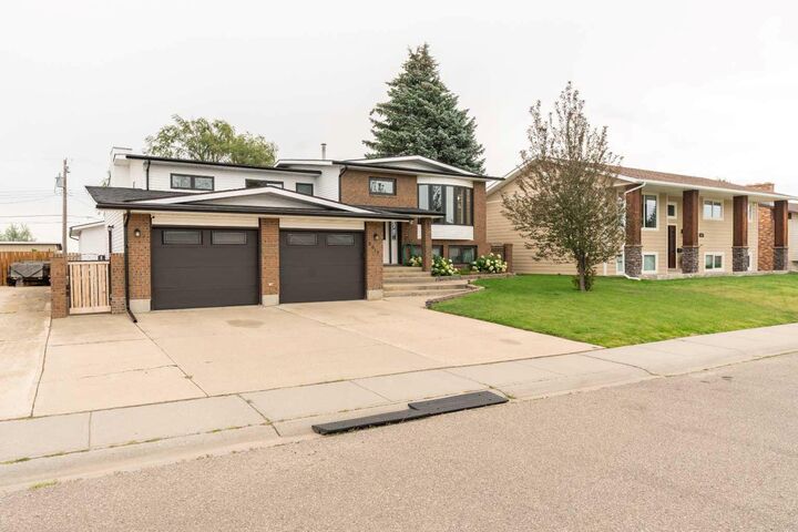 Property Photo: 6017 57 Street AB T1G 1K1