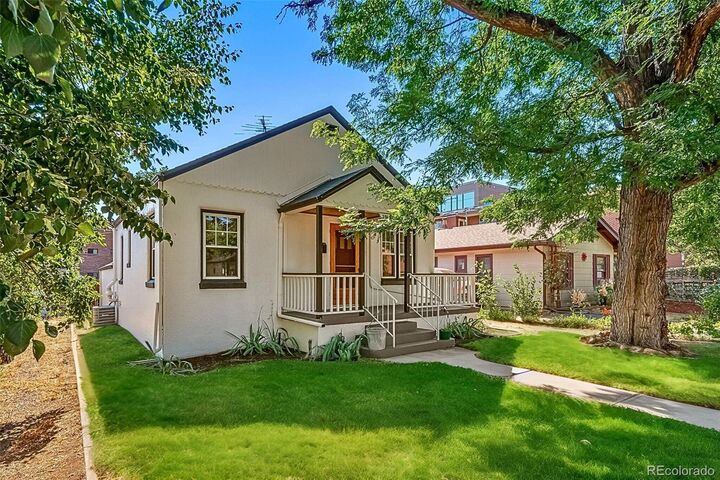 Property Photo:  3388 S Washington Street  CO 80113 