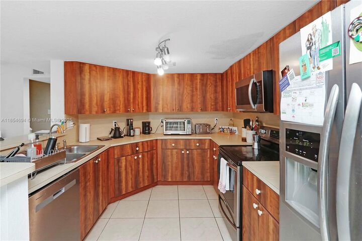 Property Photo: 10921 NW 88th Ter 1303 FL 33178
