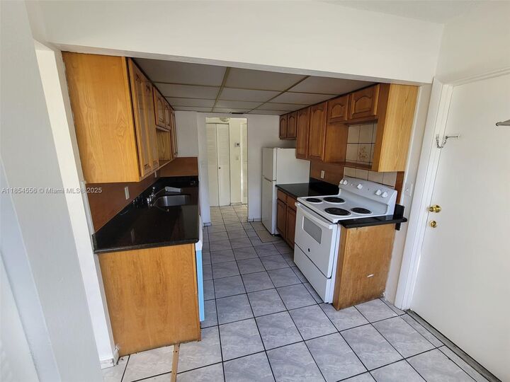 Property Photo:  16400 NE 17th Ave 206  FL 33162 