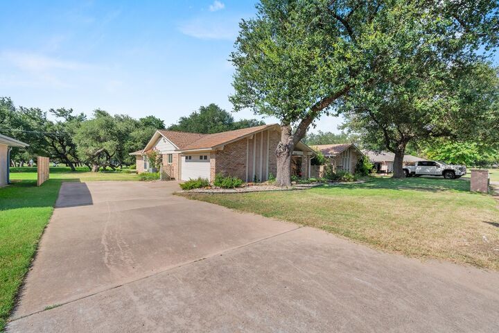 Property Photo: 8702 Balcones Club Drive TX 78750