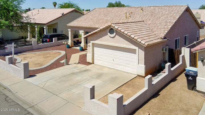 Property Photo:  2014 N 87th Drive  AZ 85037 