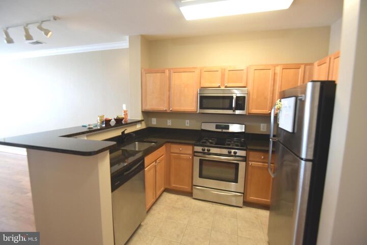 Property Photo:  12000 Market Street 311  VA 20190 
