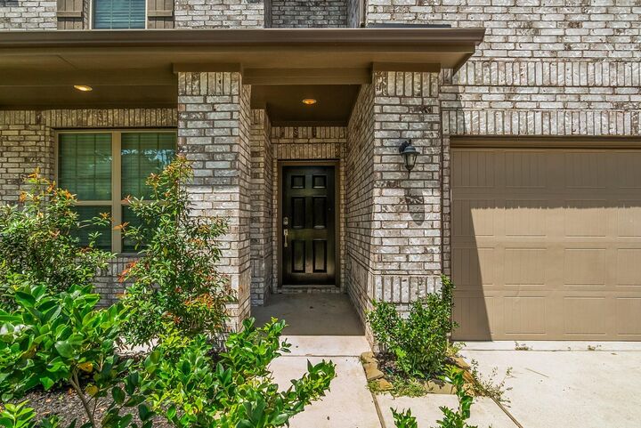 Property Photo:  205 Rose Gum Court  TX 77318 