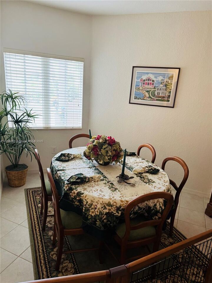 Property Photo: 5650 NW 115th Ct 104 FL 33178