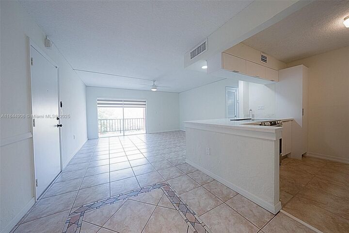 Property Photo:  7208 Fairway Dr I6  FL 33014 