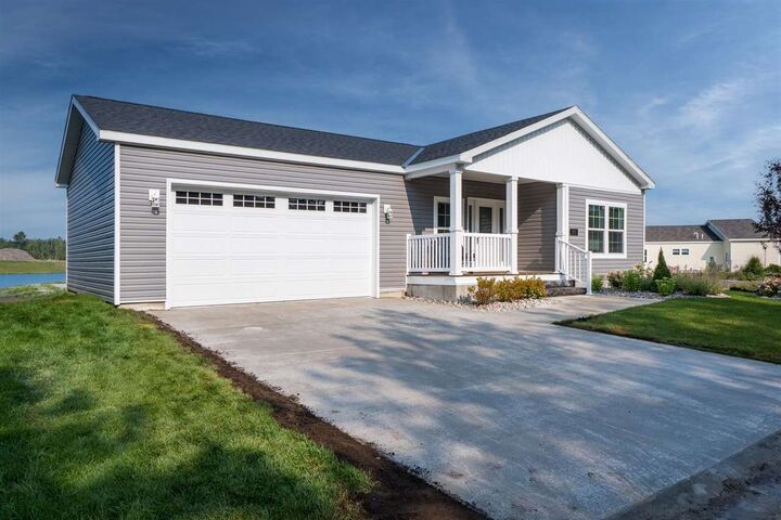 Property Photo:  1616 Pond Circle 65  MI 49770 