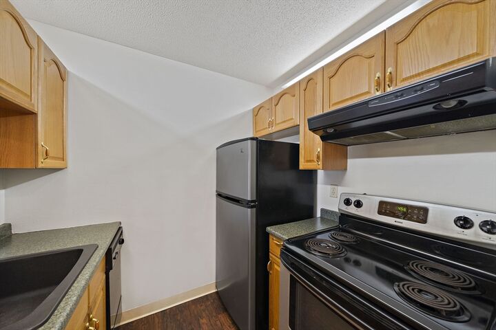 Property Photo: 133 Commander Shea Blvd 215 MA 02171