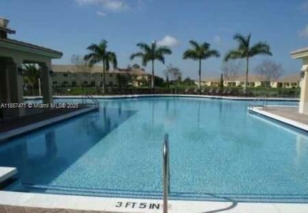 Property Photo:  945 NE 34th Ave 104  FL 33033 