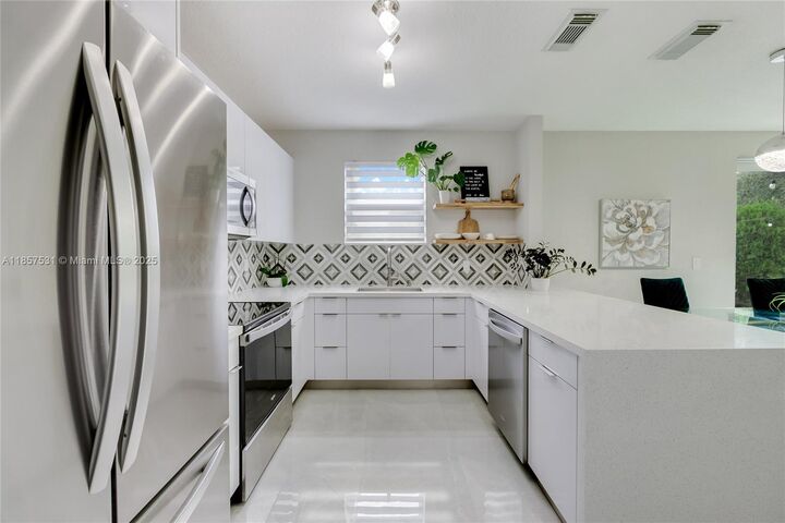 Property Photo:  801 NW 134th Ave  FL 33028 